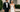Bride and groom in custom black tuxedo and wedding gown outside Columbia South Carolina wedding venue
