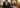 well dressed man in lightweight navy suit at an upscale outdoor Southern wedding during golden hour