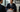 Financial advisor in a custom tailored suit projecting confidence and executive presence during a client meeting
