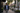 Man wearing a custom sport coat walking through Ballantyne Charlotte near shops and restaurants